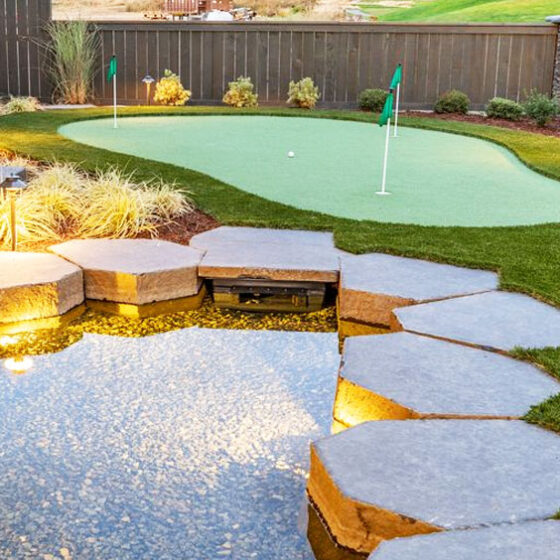 Synthetic turf putting green next to water feature in Vancouver WA