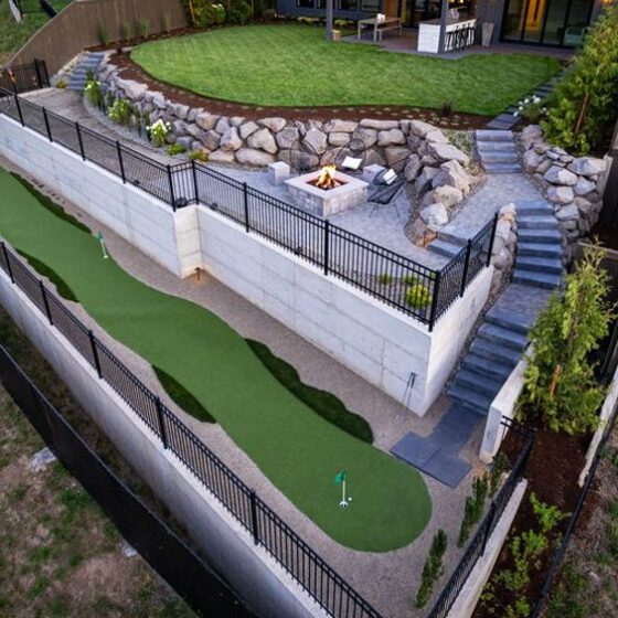 Aerial shot of Synthetic turf putting green and retaining wall hardscaping in Vancouver, WA