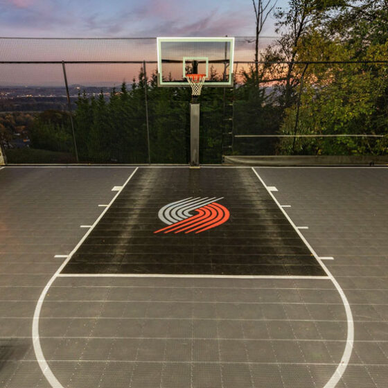 Fenced in sports court in Vancouver WA blazers logo