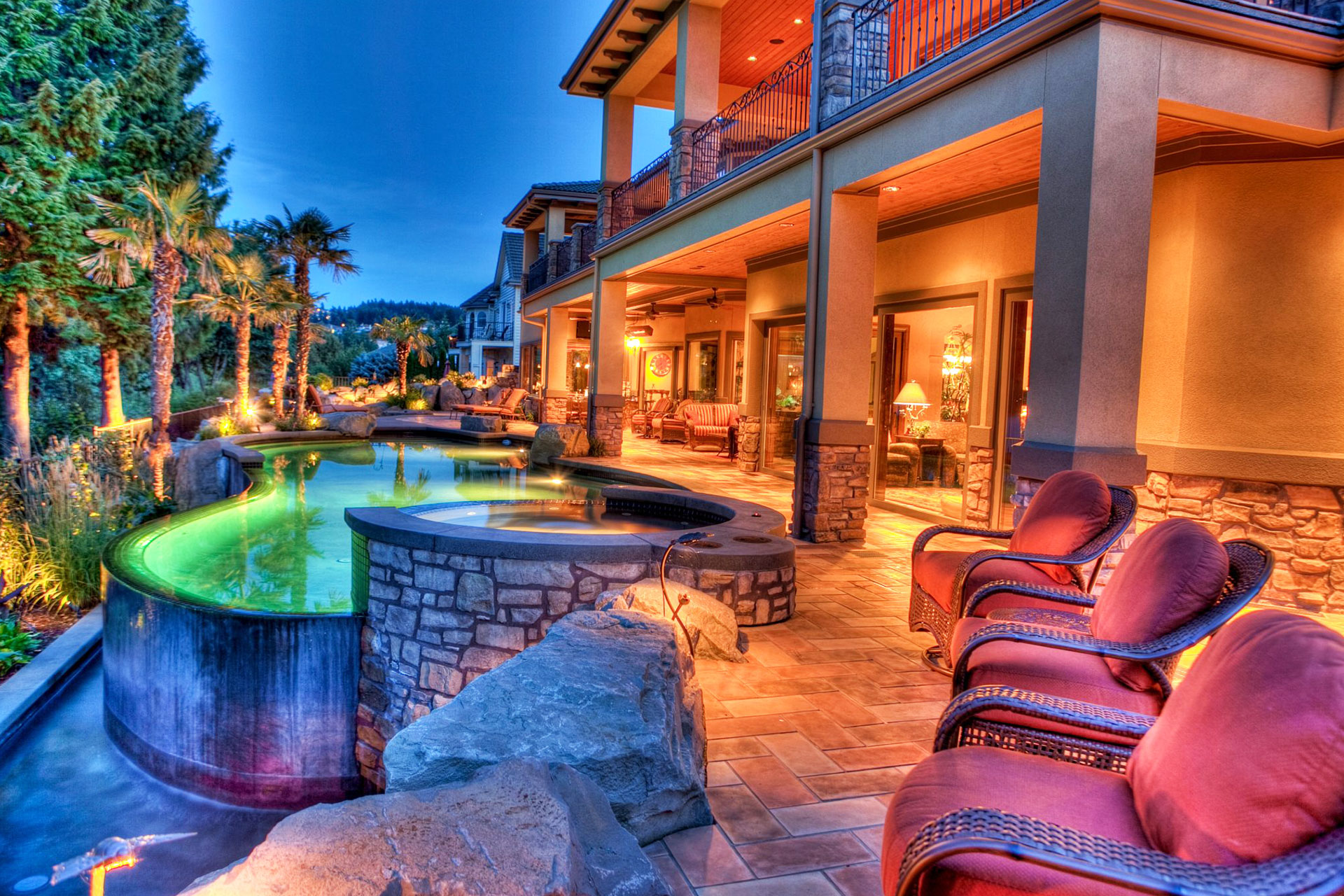 Patio with pool and hot tub in Vancouver, WA