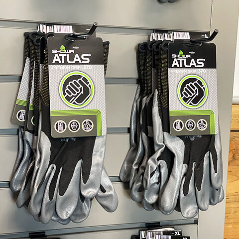 Garden Supply Gloves on retail shelf hooks in Vancouver WA